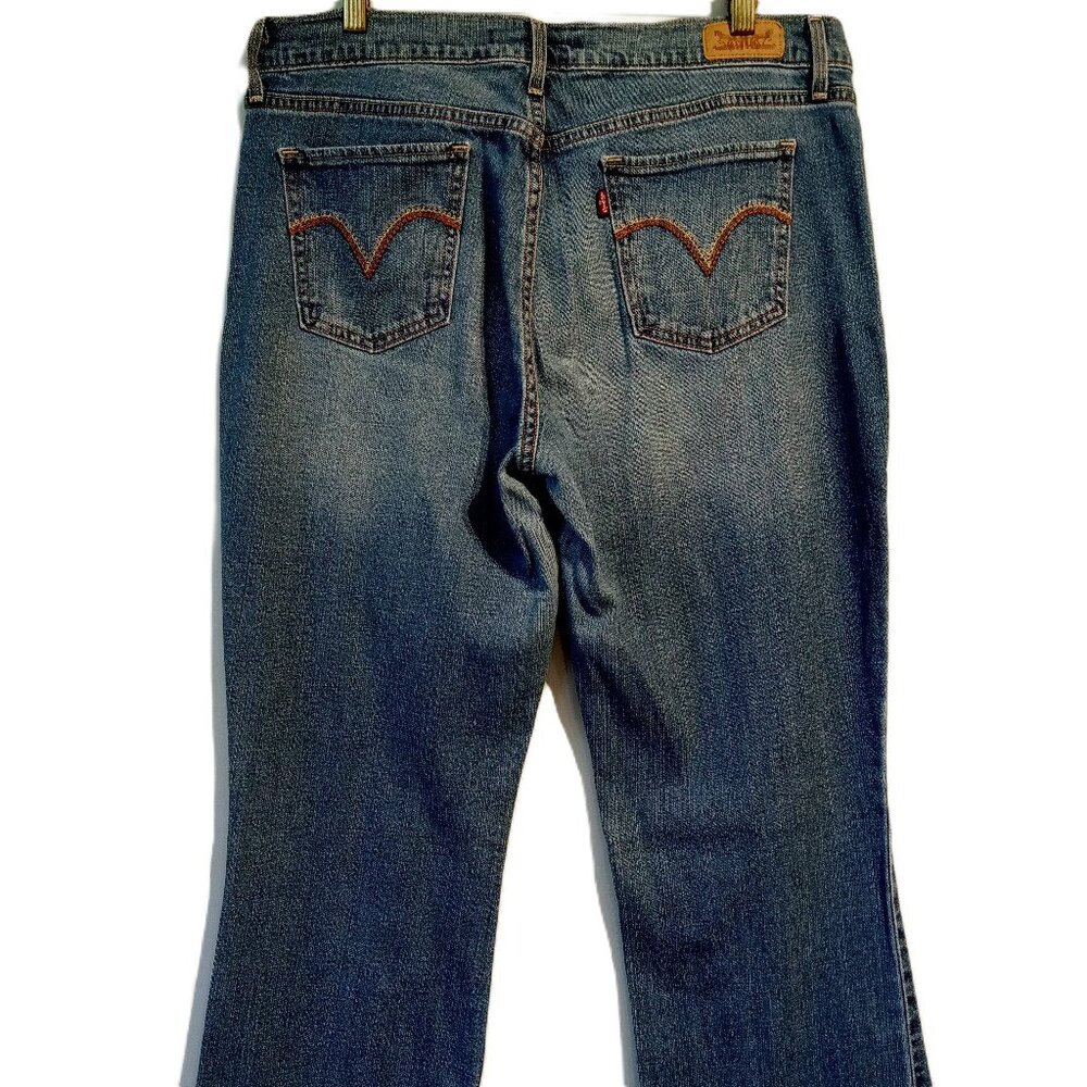 Levi's 515 Jeans   Women's 12  Bootcut  Back pocket Stitch  Stretch Denim  GUC